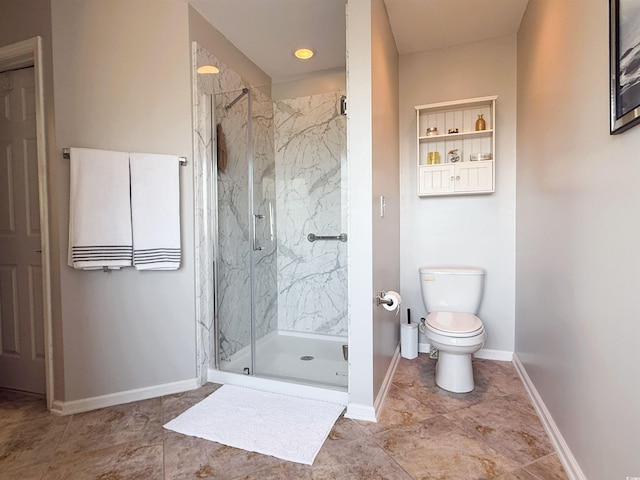 full bathroom featuring baseboards, toilet, and a marble finish shower