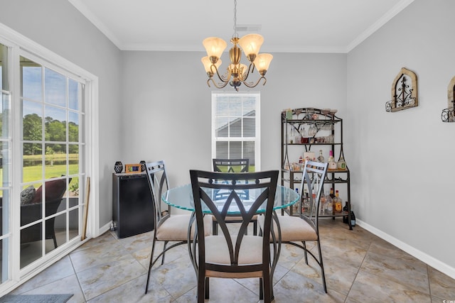 dining space with a chandelier, crown molding, and baseboards