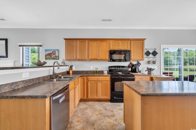 kitchen featuring black appliances, a sink, dark countertops, crown molding, and light tile patterned floors