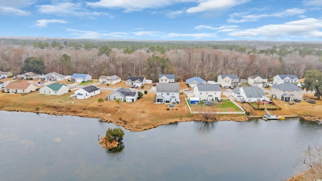 bird's eye view with a water view and a residential view