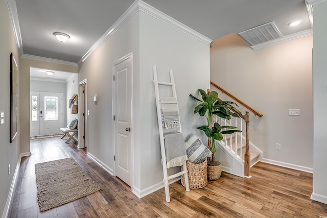 corridor featuring crown molding and wood-type flooring