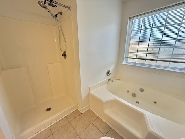 4273 Santolina Way Unit E, Murrells Inlet, SC 29576 - bathroom featuring a jetted tub, tile patterned flooring, a shower, and baseboards
