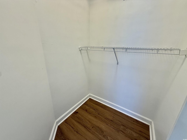 4273 Santolina Way Unit E, Murrells Inlet, SC 29576 - spacious closet featuring dark wood-type flooring