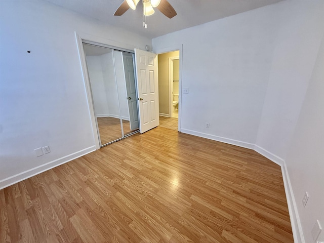 4273 Santolina Way Unit E, Murrells Inlet, SC 29576 - unfurnished bedroom featuring light wood-type flooring, baseboards, a closet, and a ceiling fan
