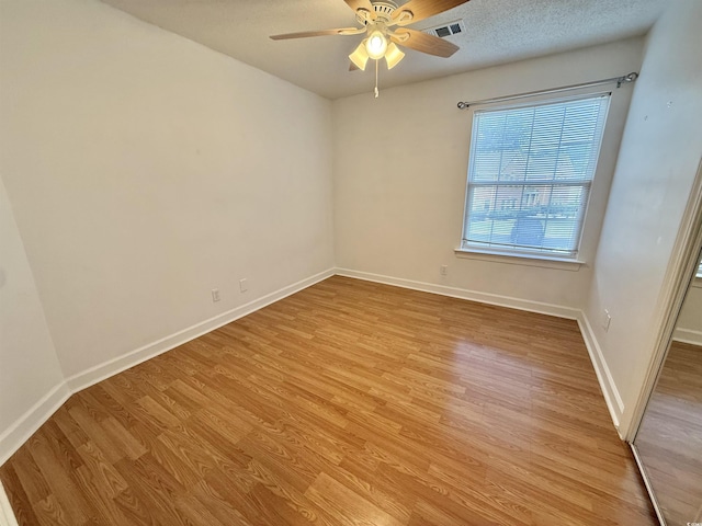 4273 Santolina Way Unit E, Murrells Inlet, SC 29576 - spare room featuring light wood finished floors, ceiling fan, and baseboards