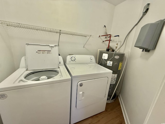 4273 Santolina Way Unit E, Murrells Inlet, SC 29576 - laundry room with water heater, washer and clothes dryer, wood finished floors, and baseboards