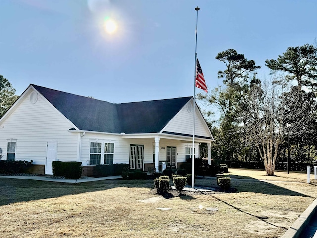 4273 Santolina Way Unit E, Murrells Inlet, SC 29576 - view of front of home featuring a porch and a shingled roof
