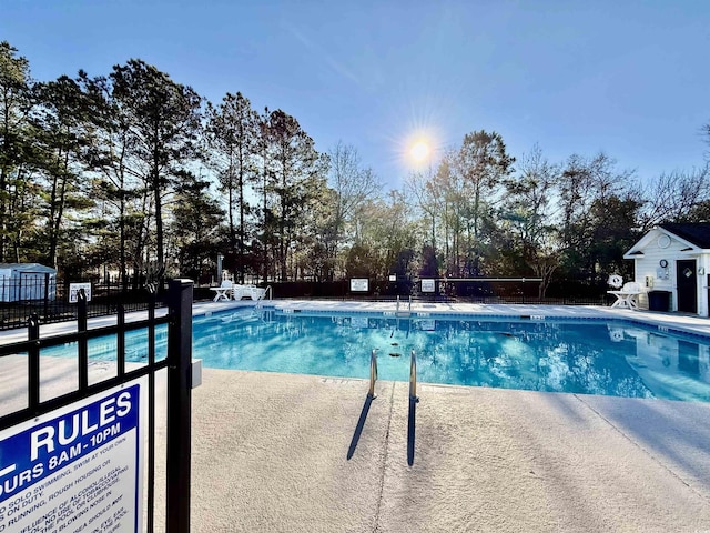 4273 Santolina Way Unit E, Murrells Inlet, SC 29576 - community pool with view of wooded area and a patio