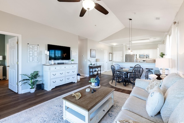 living room with visible vents, baseboards, ceiling fan, lofted ceiling, and wood finished floors