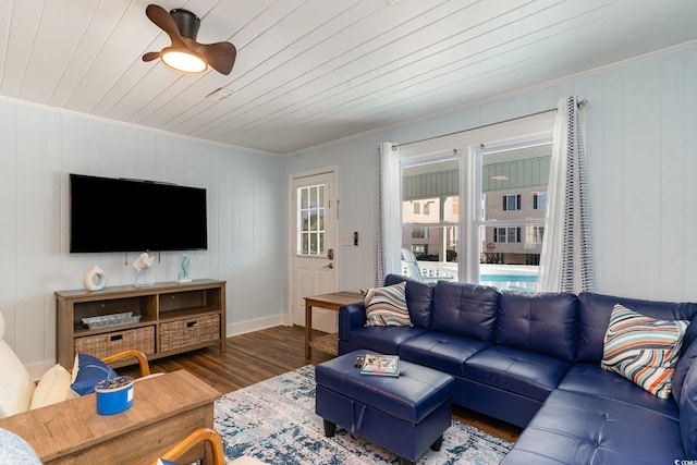 living room featuring ceiling fan, crown molding, wood-type flooring, and wooden ceiling