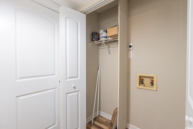 laundry room featuring laundry area, washer hookup, baseboards, light wood finished floors, and electric dryer hookup