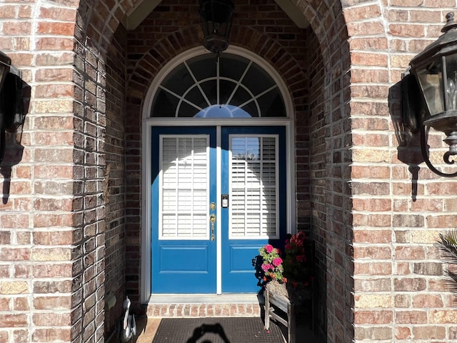 entrance to property featuring french doors