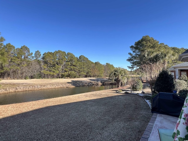 view of yard with a water view