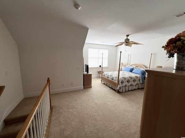 bedroom featuring ceiling fan and light colored carpet