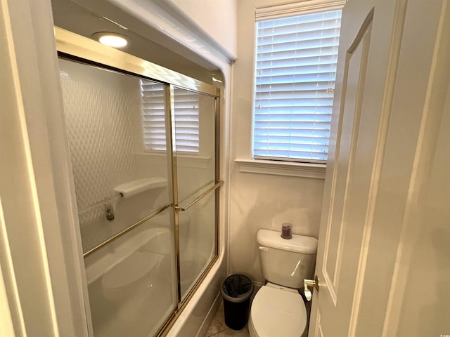 bathroom featuring toilet and tile patterned floors