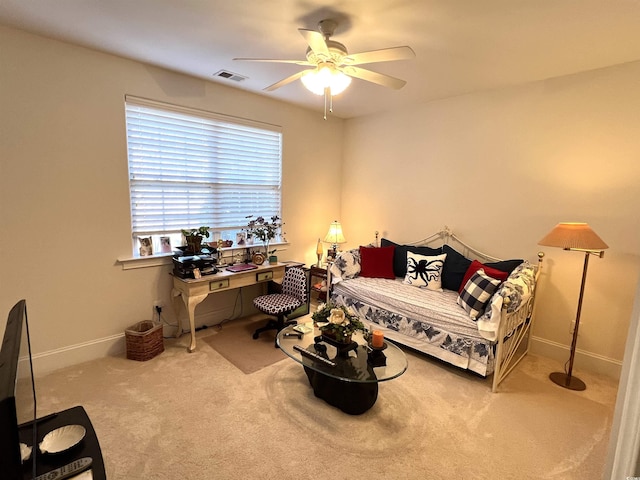 bedroom with ceiling fan and carpet floors