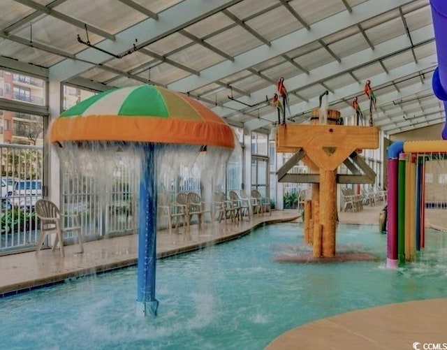 view of pool featuring pool water feature