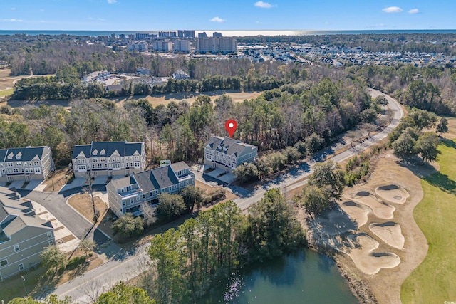 bird's eye view with a water view