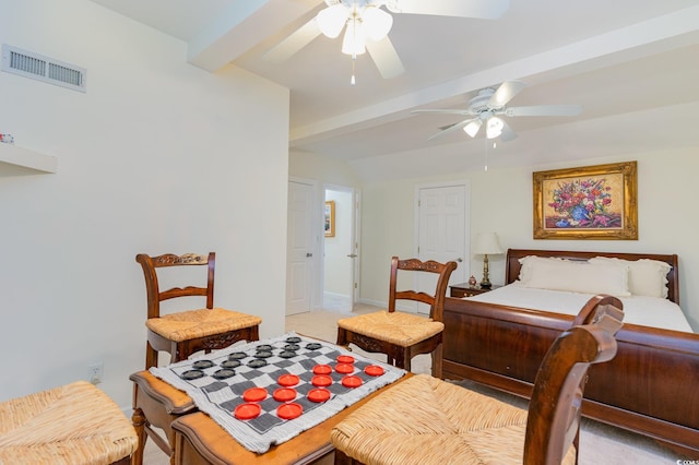 carpeted bedroom featuring ceiling fan and beam ceiling