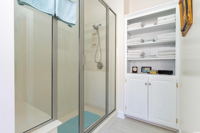 bathroom featuring walk in shower