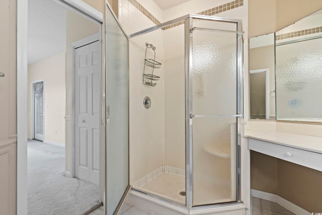 bathroom featuring a stall shower