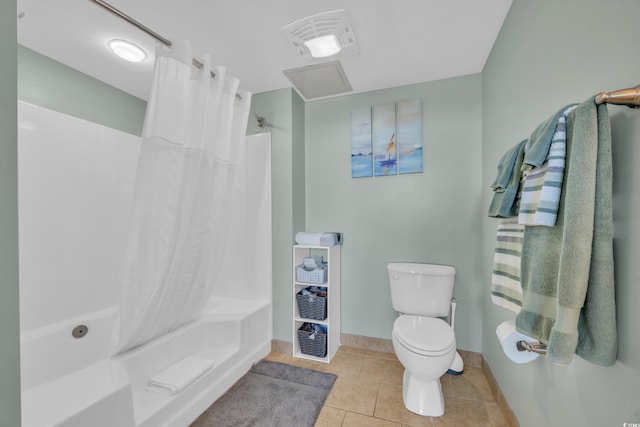 bathroom with toilet, tile patterned flooring, and shower / bathtub combination with curtain