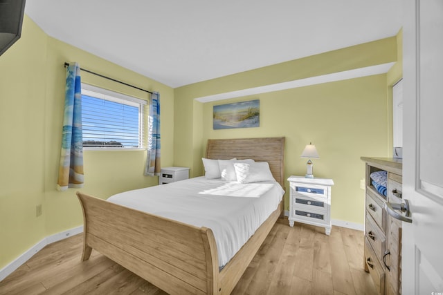 2100 Sea Mountain Hwy Unit 630, North Myrtle Beach, SC 29582 - bedroom featuring baseboards and light wood-type flooring