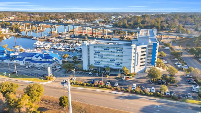 birds eye view of property featuring a water view