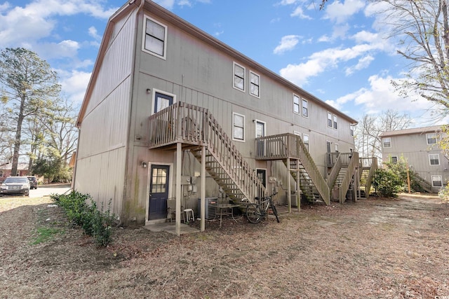 back of property with central AC unit