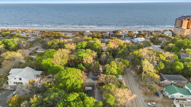 aerial view with a water view and a beach view