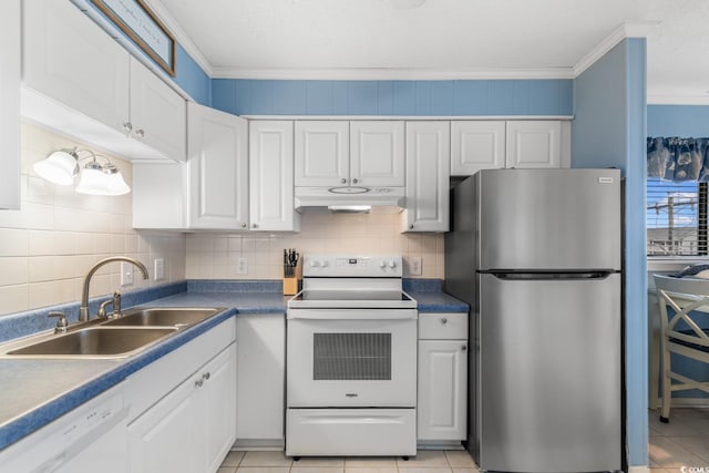 kitchen featuring white appliances, white cabinets, sink, ornamental molding, and light tile patterned floors