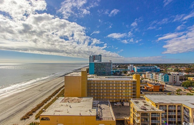 property's view of city featuring a beach view and a water view