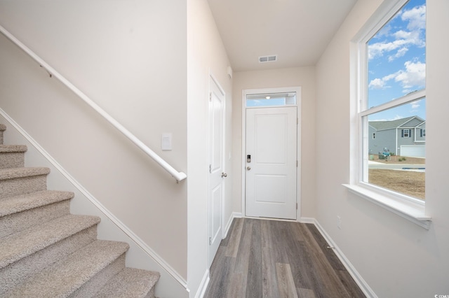 doorway to outside featuring hardwood / wood-style flooring