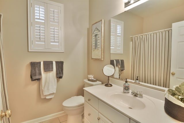 bathroom featuring vanity, curtained shower, tile patterned floors, and toilet