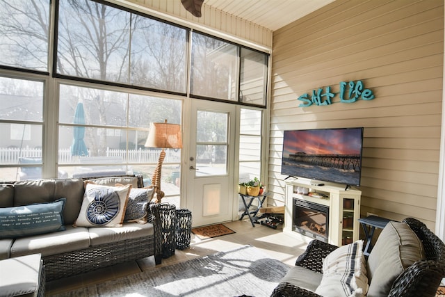 living room featuring wooden walls