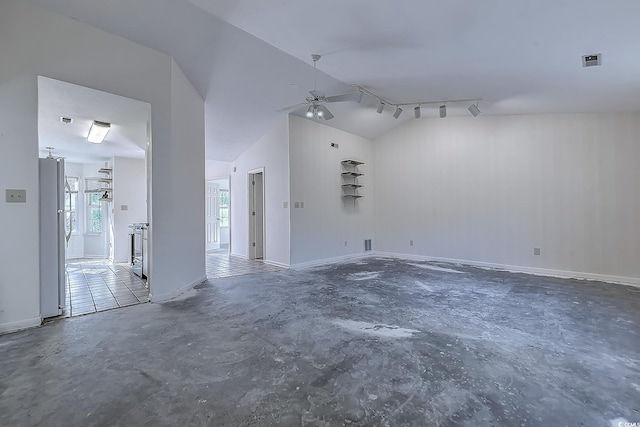 unfurnished living room featuring ceiling fan, track lighting, and vaulted ceiling