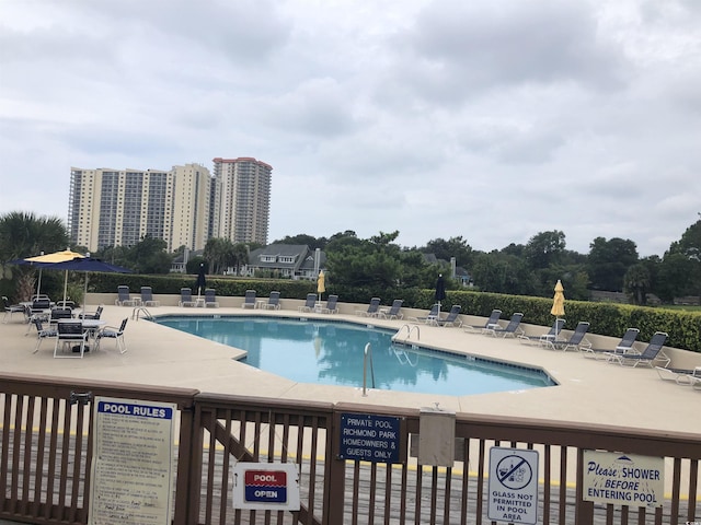 view of pool with a patio