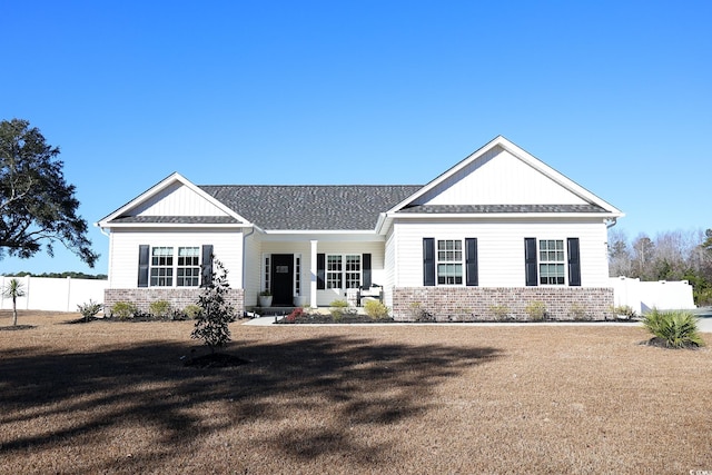 view of front of property with a front lawn