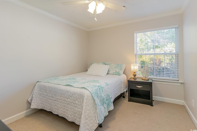 bedroom featuring ceiling fan, light colored carpet, and ornamental molding