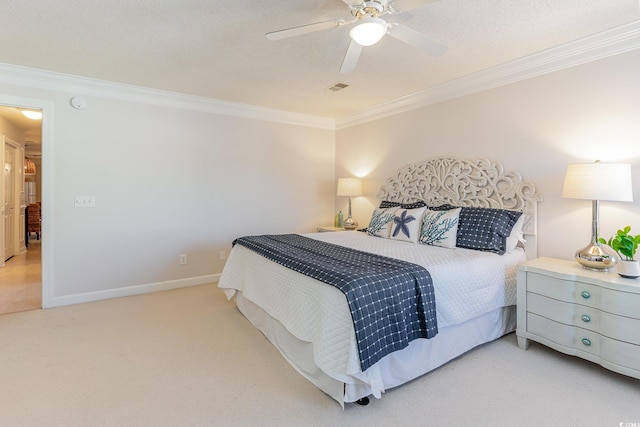 bedroom with ceiling fan, light colored carpet, and ornamental molding