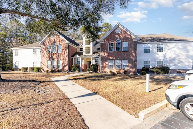 view of front property with a front yard