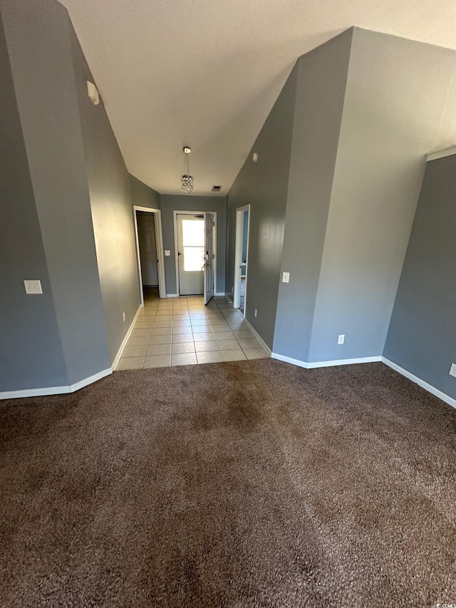 interior space featuring vaulted ceiling