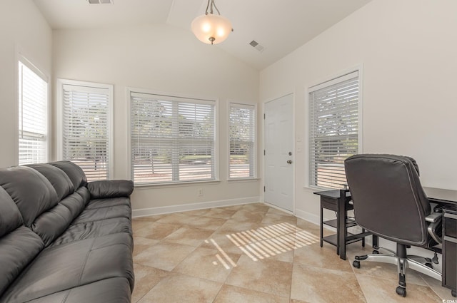 home office featuring lofted ceiling