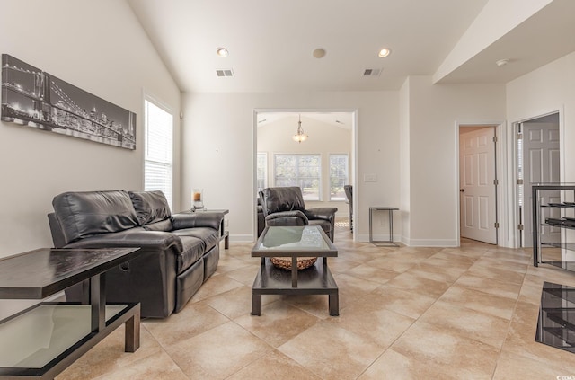 living room with vaulted ceiling