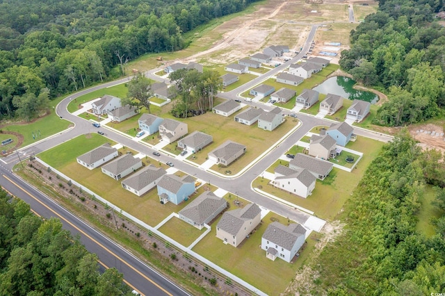 1480 Nokota Dr, Conway, SC 29526 - aerial view of property and surrounding area featuring a forest and nearby suburban area