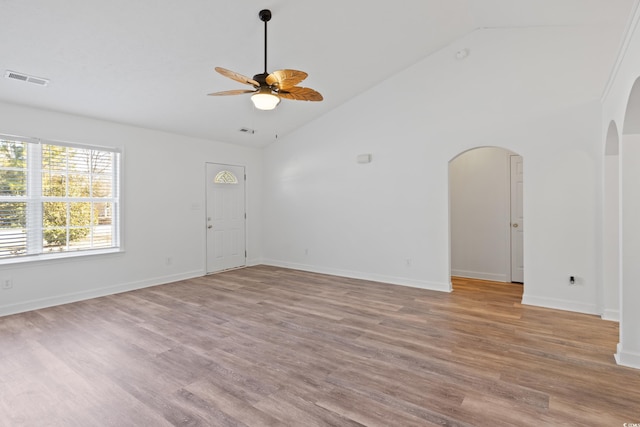 5933 Rahnavard Blvd, Myrtle Beach, SC 29588 - spare room with ceiling fan, high vaulted ceiling, visible vents, arched walkways, and wood finished floors