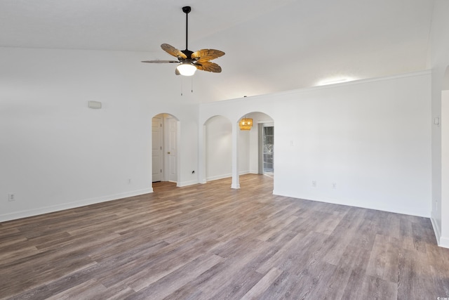 unfurnished room with light hardwood / wood-style flooring, ceiling fan, and vaulted ceiling