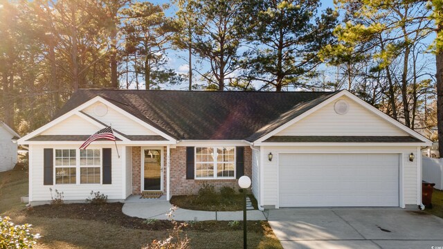 single story home featuring a garage