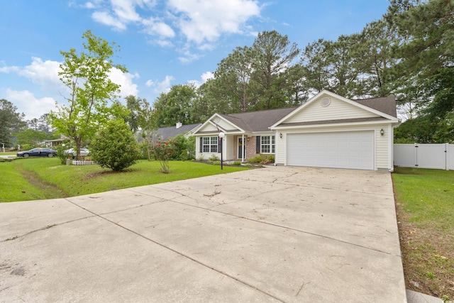 5933 Rahnavard Blvd, Myrtle Beach, SC 29588 - ranch-style home featuring driveway, a gate, an attached garage, fence, and a front lawn