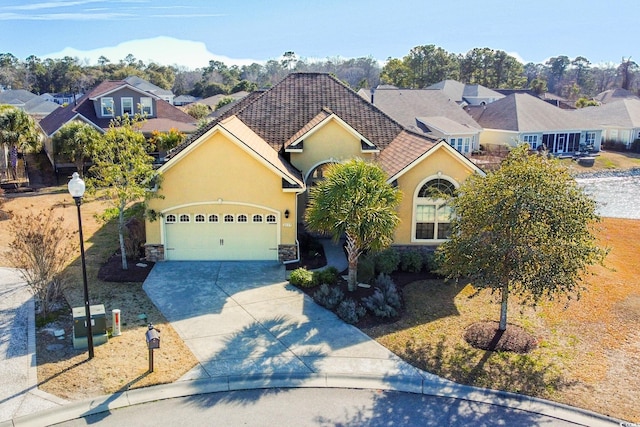 front of property with a garage